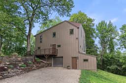 Moss's Muse: A Modern Summer Retreat